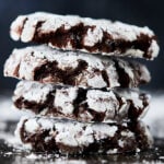 Chocolate crinkle cookies stacked