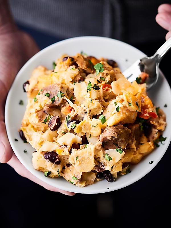 Crockpot breakfast casserole in a bowl held