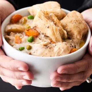 Crockpot Chicken and Dumplings. Winter comfort food! Quick & easy, SO hearty and cozy! Uses refrigerated biscuit dough! No Cream of X Soup! showmetheyummy.com #crockpot #chicken #dumplings