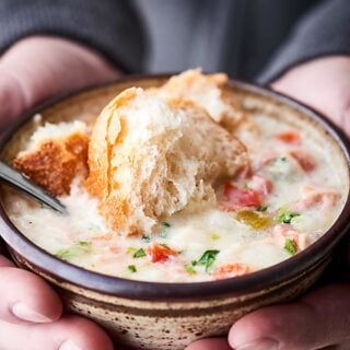 This Crockpot Potato Soup is SO quick and easy to make and is loaded with leftover ham, bacon, and frozen hash browns! Gluten free and no cream of "x" soup! showmetheyummy.com #crockpot #potatosoup