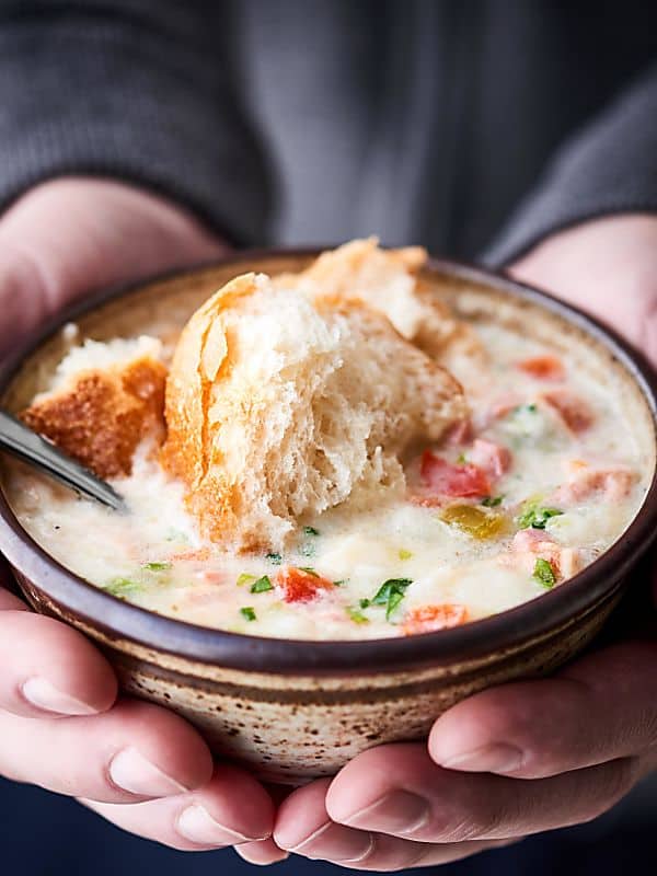 This Crockpot Potato Soup is SO quick and easy to make and is loaded with leftover ham, bacon, and frozen hash browns! Gluten free and no cream of "x" soup! showmetheyummy.com #crockpot #potatosoup