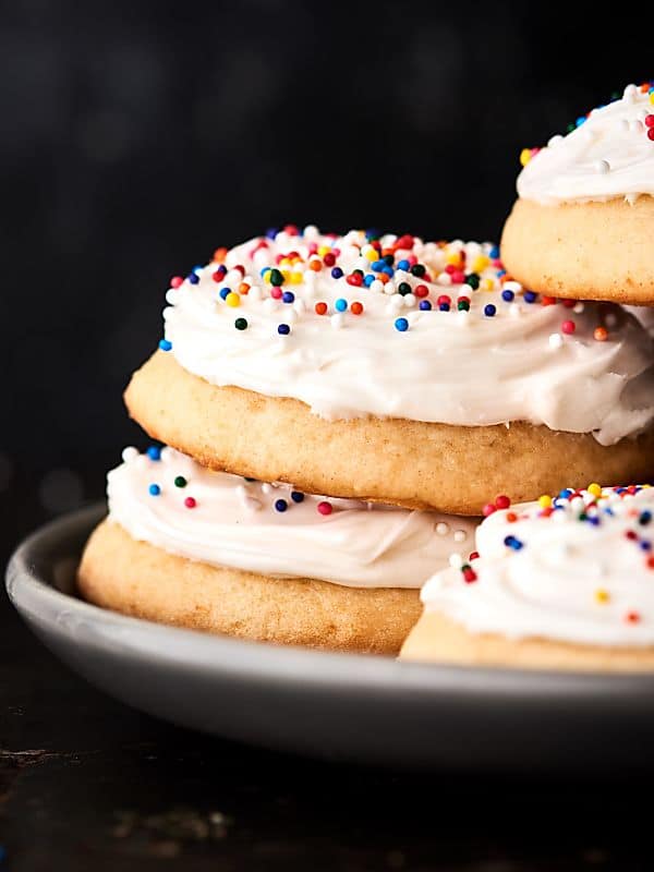 Grandma's best sugar cookies stacked on plate