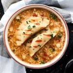 This Egg Drop Wonton Soup is a twist on three of my FAVE Asian soups: hot and sour, egg drop, and wonton soup! Ready in about 15 minutes. Healthy and can be vegetarian! showmetheyummy.com #soup #healthy