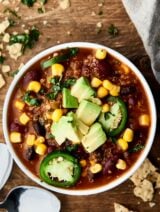This Instant Pot Vegetarian Chili is SO quick and easy to make and full of vegetables, beans, and quinoa! Healthy. Gluten free. Vegan. Ready in 30 mins! Less than 300 calories per serving. showmetheyummy.com #instantpot #vegan #healthy #chili