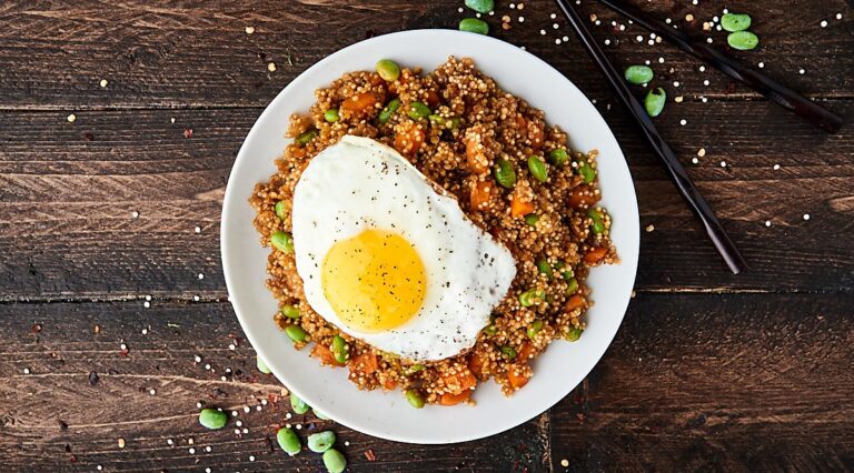 Quinoa fried rice with egg on plate above