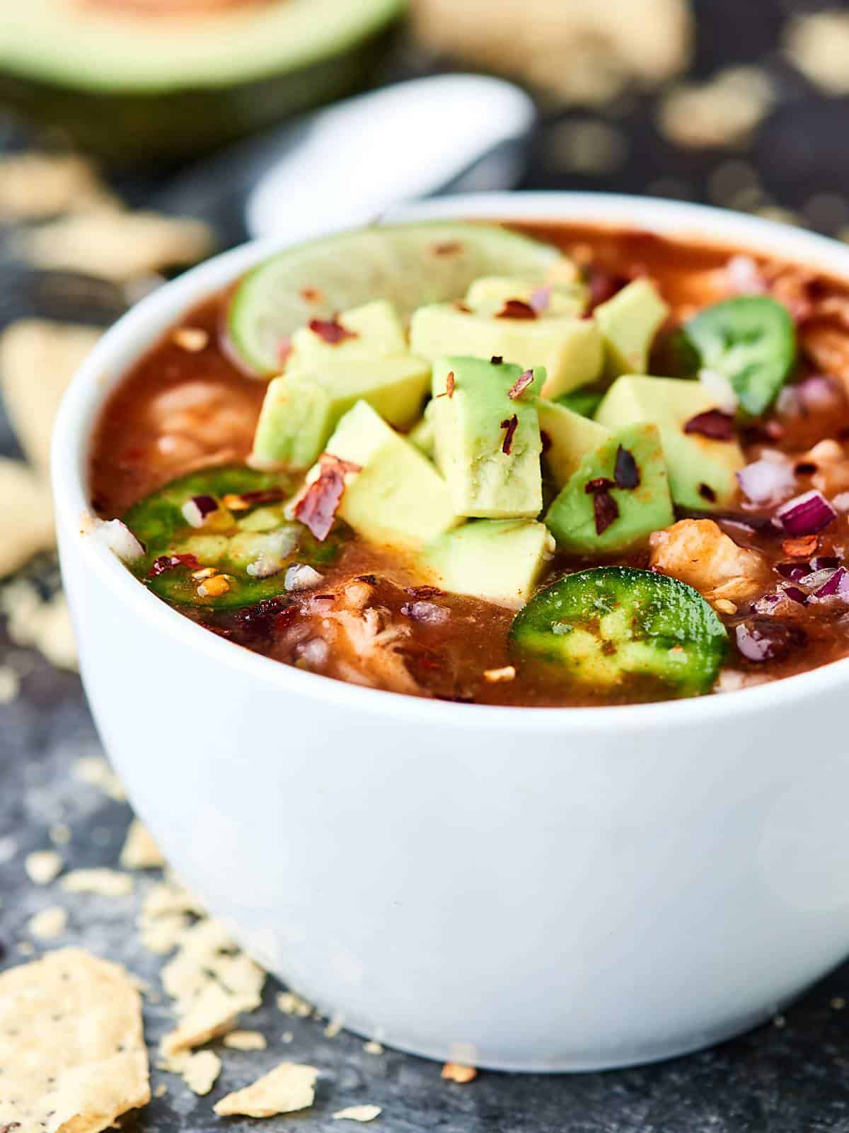 Slow Cooker Enchilada Soup Recipe - Chicken, Beans, Hominy, and More!