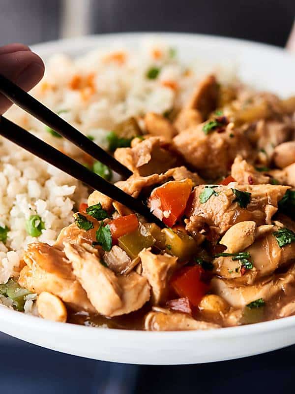 Kung pao chicken and rice on plate
