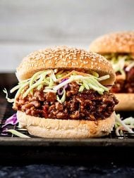 An Asian twist on a classic, these Asian Sloppy Joes are seriously SO delicious. Full of ground pork, hoisin sauce, ginger, chili garlic sauce, and more! You’ll never guess this flavor packed recipe is SO easy! showmetheyummy.com #sloppyjoes #asian