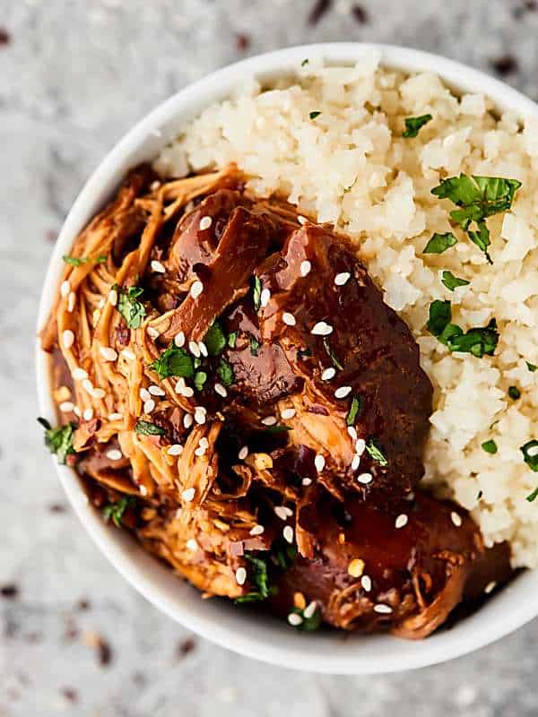 teriyaki chicken with rice in bowl above
