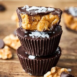 #ad A healthier take on a peanut butter cup, these homemade dark chocolate walnut butter cups are quick, easy, delicious, and full of toasted walnuts, extra virgin olive oil, a touch of maple syrup, and sea salt! showmetheyummy.com Made in partnership w/ @CAWalnuts #healthy #chocolate