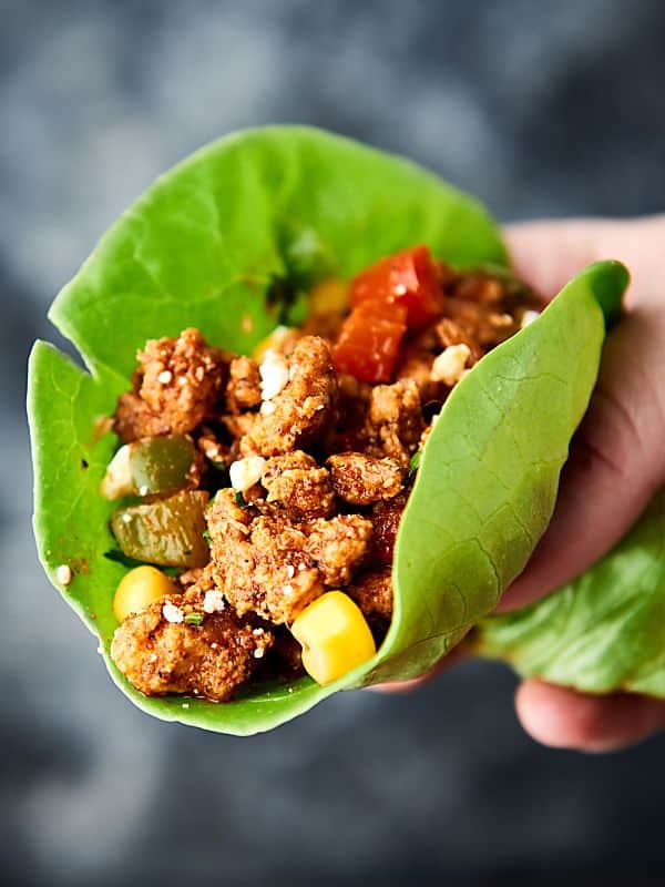 Lettuce wrap turkey taco being held 