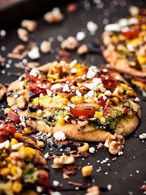 mini pizza on baking sheet