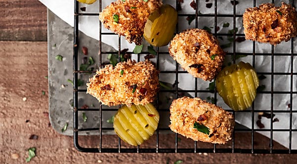 These Air Fryer Chicken Nuggets are a healthier, easier, and tastier homemade version of a drive through or frozen classic! Chicken breasts marinated in buttermilk, my secret ingredient and salt, then tossed in panko, whole wheat flour, and spices! showmetheyummy.com #airfryer #chickennuggets