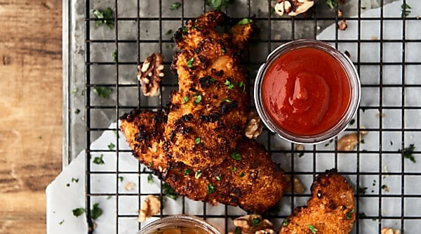 #ad This Air Fryer Sweet and Spicy Walnut Chicken Tenders Recipe is a quick, easy, healthier twist on a fast food classic! Only seven ingredients necessary! showmetheyummy.com Made in partnership w/ @CAWalnuts #chickentenders #airfryer