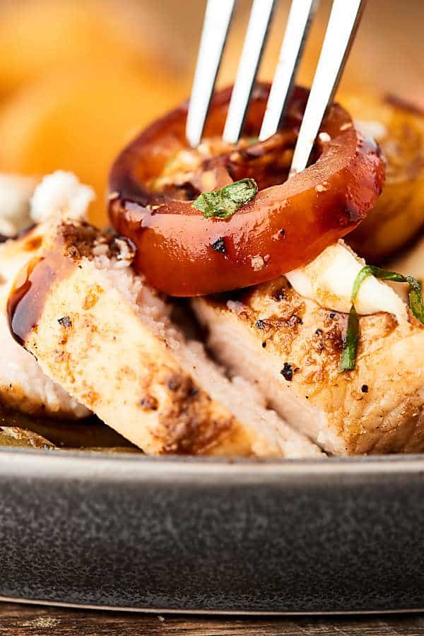 fork in bruschetta chicken closeup