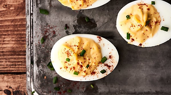 These Easy Deviled Eggs are a cinch to make thanks to my trick for making the best hard boiled eggs! They're also delicious and loaded with the creamiest filling of mayo, apple cider vinegar, dijon, horseradish, Worcestershire, relish, salt, paprika, and chives! showmetheyummy.com #deviledeggs #eggs