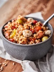 #ad This Antipasto Farro Salad is loaded with farro and all your favorite antipasto ingredients: roasted red pepper, tomatoes, onion, pepperoni, salami, mozzarella, pepperoncinis, olives, and more! Light yet SO satisfying. showmetheyummy.com Made in partnership w/ @bobsredmill #farro #antipasto #salad
