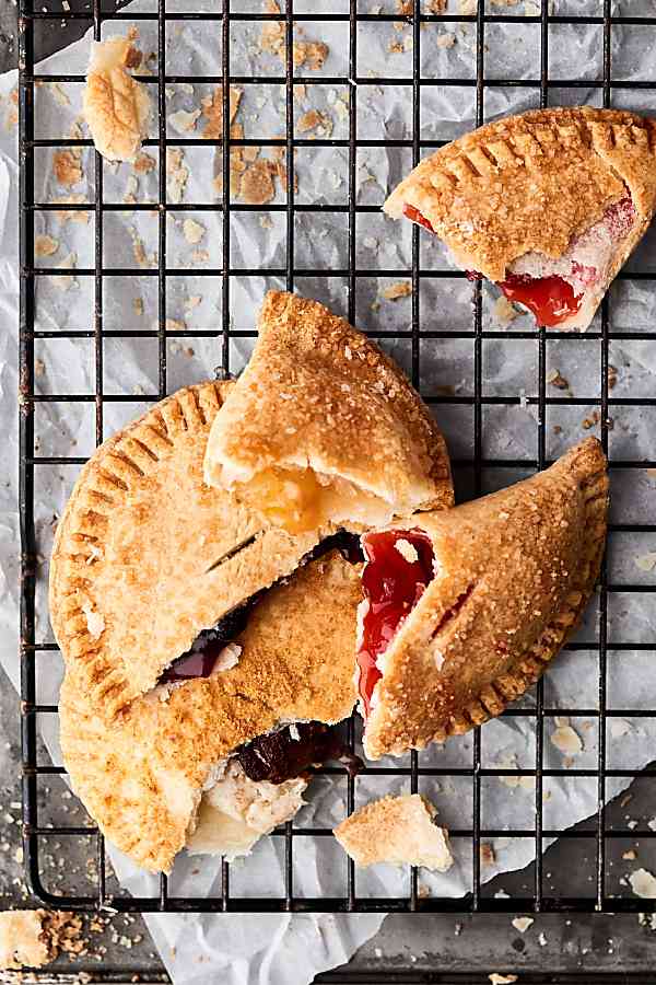 Air fryer hand pies on cooling rack above