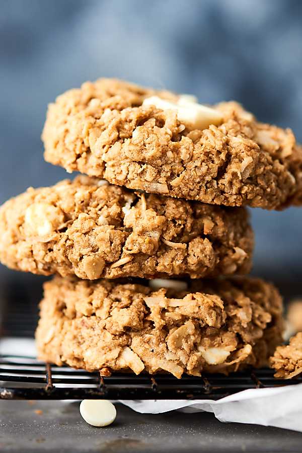 three coconut oatmeal cookies stacked