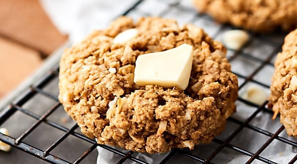 These Easy Coconut Oatmeal Cookies are gluten free and full of old fashioned oats, white chocolate, and sweetened coconut! Quick, easy, thick, chewy, and soooo warm and cozy! showmetheyummy.com #glutenfree #cookies #oatmealcookies #coconutoatmealcookies #whitechocolate