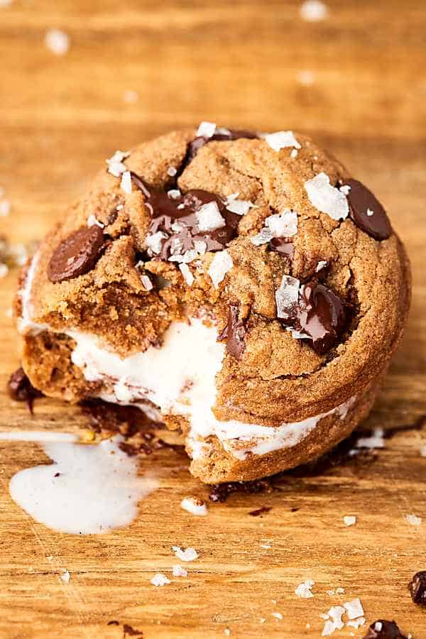 These Healthy Whole Wheat Chocolate Chip Cookies are loaded with whole wheat flour, a touch of brown sugar, coconut oil, egg, and dark chocolate chips. Reduced sugar. No butter. Still delicious. You're gonna love 'em! showmetheyummy.com #wholewheat #chocolatechip #cookies
