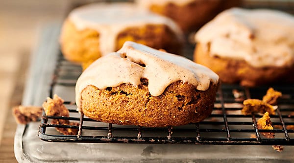 {New!} #ad Vegan Pumpkin Cookies with Maple Glaze. Hearty, slightly healthier pumpkin cookies made with whole wheat flour, spices, coconut oil, pumpkin, and maple syrup. Bonus: they get drizzled in the easiest vegan glaze! showmetheyummy.com Made in partnership w/ @bobsredmill #vegan #pumpkin #cookie