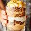 Caramel Apple Cheesecake Parfaits. Graham cracker crumbles, easy no-bake caramel cheesecake filling, pecans, cool whip, and apple pie filling . . . This cozy fall dessert is easy AND delicious! Cool whip and canned apple pie filling alternatives included! showmetheyummy.com #cheesecake #caramel #apple #applepie