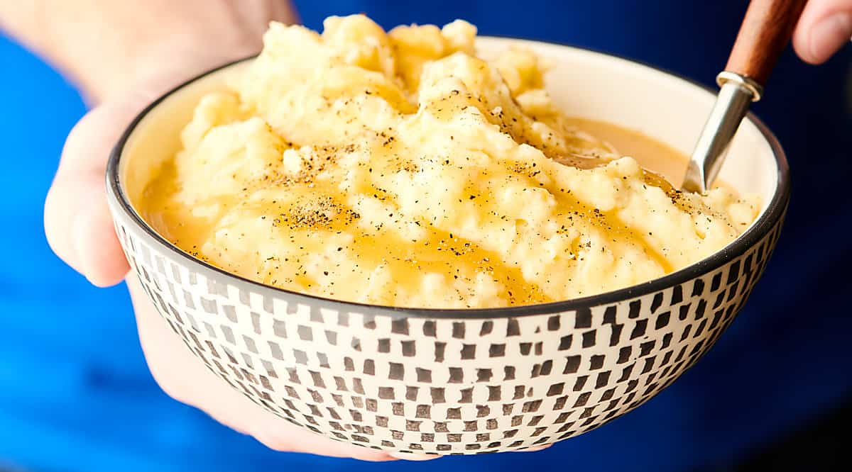 bowl of instant pot mashed potatoes held