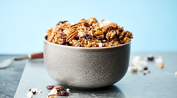 Instant Pot Wild Rice Stuffing. Can be made gluten free or vegan! Loaded with onion, celery, mushrooms, garlic, sage, thyme, rosemary, balsamic, cranberries, pecans, goat cheese, and parmesan! Quick and delicious! Perfect for a Thanksgiving side dish. showmetheyummy.com #instantpot #wildrice #stuffing #thanksgiving