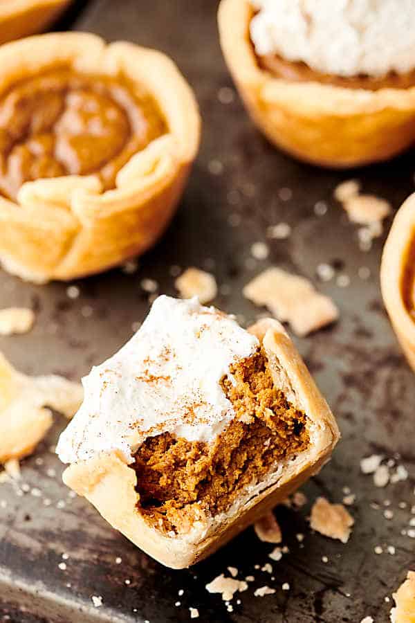 mini pumpkin pies on baking sheet