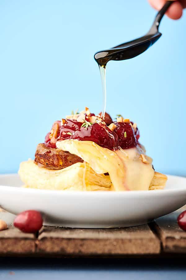 pork and brie puff pastry bite on plate side view