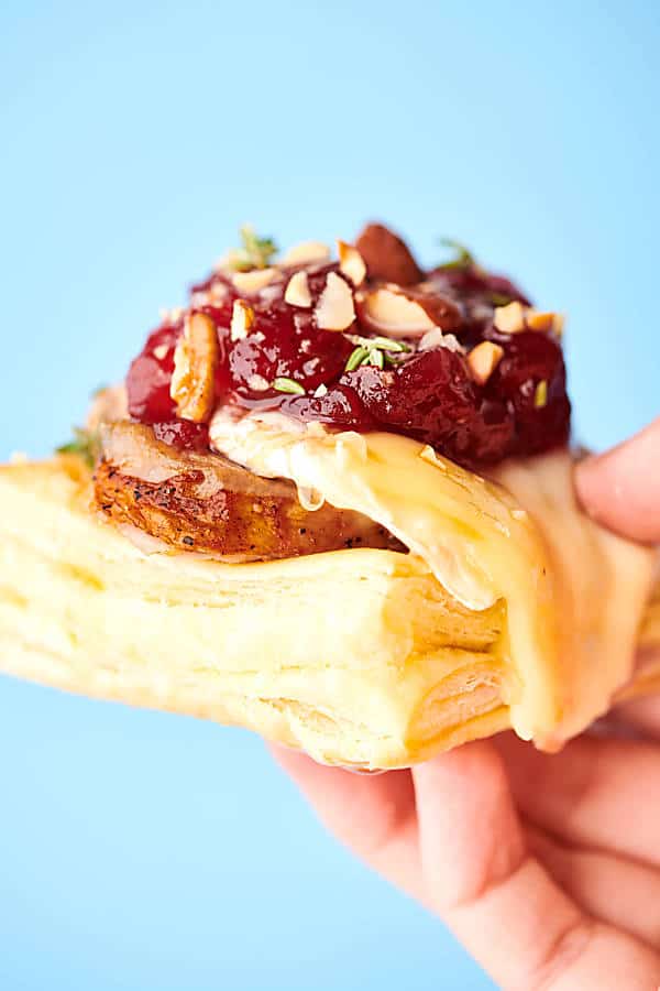 pork and brie. puff pastry bite held
