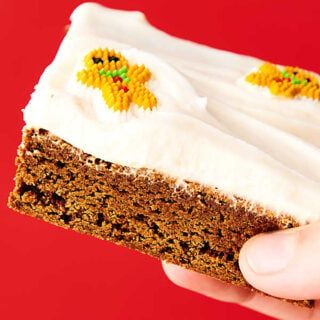 Gingerbread Cookie Bars. A cross between a cookie and a brownie, these bars are soft, chewy, dense, yet so light and full of cozy gingerbread spices. Perfect served warm with vanilla ice cream or served room temperature or chilled with an easy fluffy cream cheese frosting! showmetheyummy.com #gingerbread #cookie #bars #creamcheese #frosting