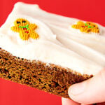 Gingerbread Cookie Bars. A cross between a cookie and a brownie, these bars are soft, chewy, dense, yet so light and full of cozy gingerbread spices. Perfect served warm with vanilla ice cream or served room temperature or chilled with an easy fluffy cream cheese frosting! showmetheyummy.com #gingerbread #cookie #bars #brownies #creamcheese #frosting