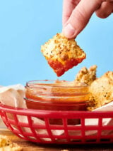 Air Fryer Fried Ravioli. A classic, lightened up! Cheese ravioli is coated in breadcrumbs, panko, parmesan, and spices, and air fried (or baked) to perfection! Serve with your favorite dipping sauce. Quick, easy, delicious! showmetheyummy.com #airfryer #friedravioli #ravioli #cheese #pasta