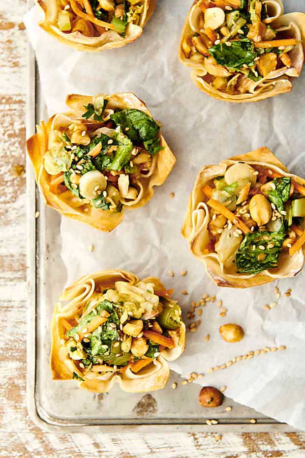chinese chicken salad wonton cups on tray above