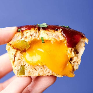 Healthy BBQ Cheddar Turkey Meatloaf Muffin Cups Recipe. These muffin tin meatloaves are loaded with oatmeal (trust me) instead of bread for a healthier twist, buttermilk, turkey, onion, peppers, spices, BBQ sauce, and a touch of cheddar cheese! Only 177 calories per cup!  showmetheyummy.com #bbq #cheddar #turkey #meatloaf #healthy #glutenfree