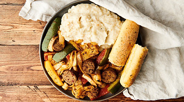 Sheet Pan Chicken Sausage and Peppers. One dirty dish, need I say more? ;) Loaded with chicken sausage, onions, peppers, and spices, this recipe is ready in under 30 minutes and packed with flavor and healthy deliciousness! Less than 250 calories per serving. showmetheyummy.com #chicken #sausage #peppers #sheetpan #onepot #dinner #kidfriendly #recipe #familydinner #healthy #glutenfree