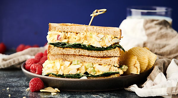 This Easy Egg Salad Recipe is great for a quick and easy, healthy, gluten free, vegetarian, low carb, meal prep lunch! Hard boiled eggs with celery, red onion, light mayo, non fat plain greek yogurt, dijon, and spices! Less than 150 calories per serving! showmetheyummy.com #eggsalad #sandwich #lowcarb #glutenfree #vegetarian #healthy #protein