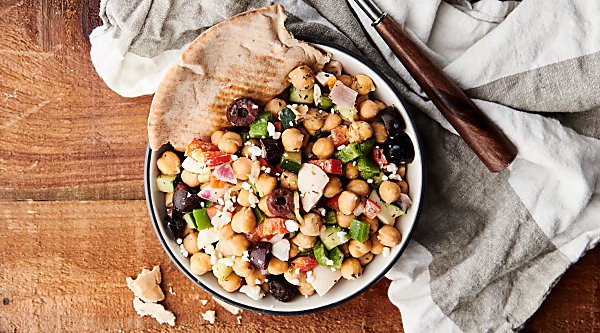 Mediterranean Chickpea Egg Salad Recipe. A chopped salad loaded with chickpeas, hard boiled eggs, red peppers, green peppers, cucumber, onion, kalamata olives, red wine vinegar, garlic powder, oregano, basil, dill, and salt! Vegetarian. Dairy Free. Gluten Free. Meal prep friendly! Healthy lunch! showmetheyummy.com #mediterranean #chickpea #egg #salad #healthy #glutenfree #dairyfree #vegetarian #mealprep #lunch
