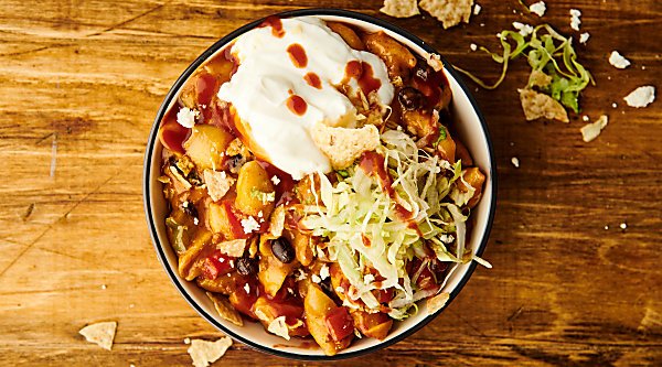This One Pot Taco Mac and Cheese is loaded with ground beef, onions, bell peppers, garlic, taco seasoning, pasta shells, milk, broth, black beans, and THREE kinds of cheese: sharp cheddar cheese, pepper jack cheese, and monterey jack cheese. Don't forget about the fun toppings like tortilla chips, sour cream, shredded lettuce, taco sauce, and more! Kid and adult approved! showmetheyummy.com #onepot #taco #mac #cheese #macandcheese