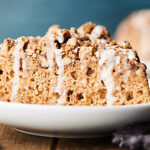Whole Grain Pancake Coffee Cake. A dense and hearty, yet moist whole grain pancake mix based coffee cake is loaded with the most delicious crumb topping and drizzled in an easy maple glaze! Perfect for a healthier cozy weekend brunch or on-the-go busy week day breakfast! showmetheyummy.com #wholegrain #pancake #coffeecake #healthy