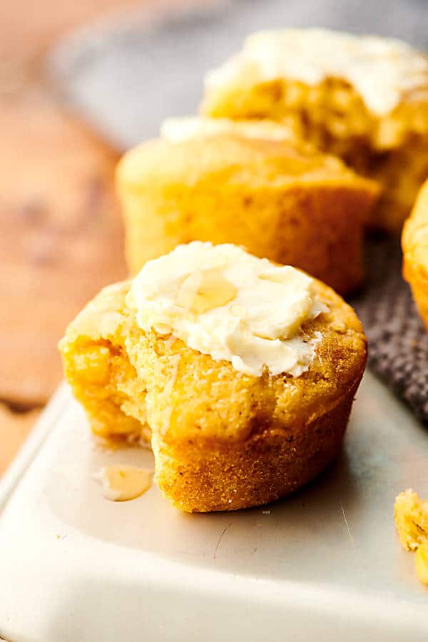 cornbread muffin on tray with others in background