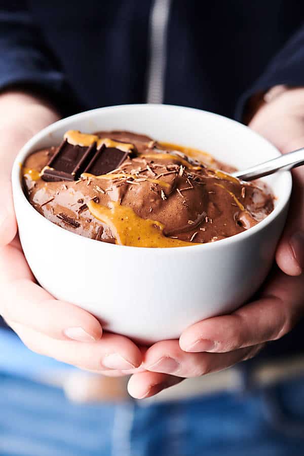 bowl of chocolate banana ice cream held