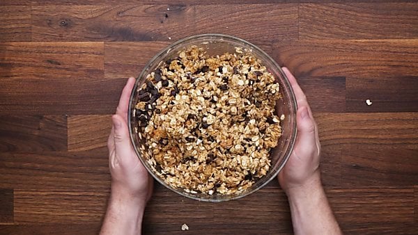 granola bar recipe ingredients in mixing bowl