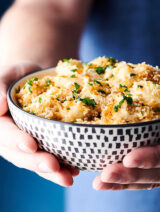 Crab Mac and Cheese holding in hands