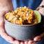 Mexican Corn Casserole holding in hand