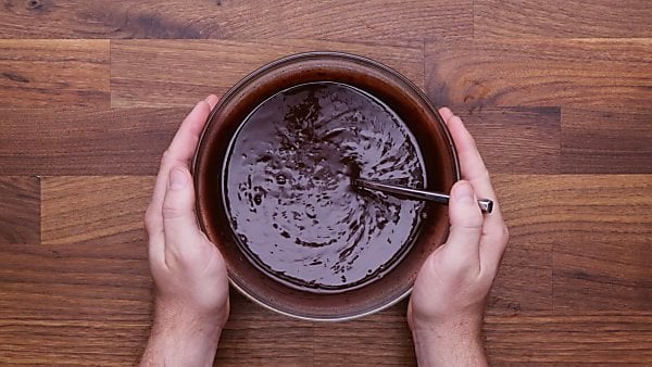 Chocolate ganache in mixing bowl