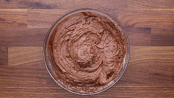 Chocolate lava cake batter in mixing bowl