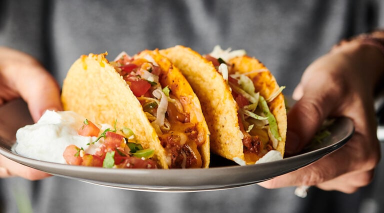 Supreme Pizza Tacos on a plate horizontal